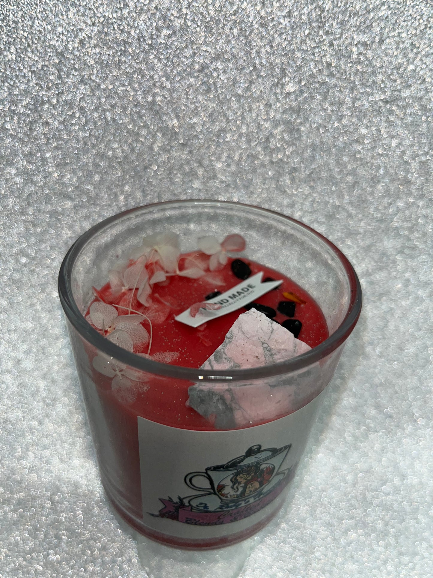 Handmade scented candles with gems.