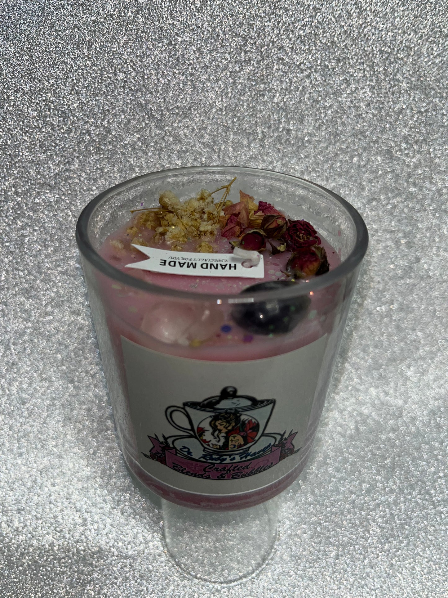 Handmade scented candles with gems.